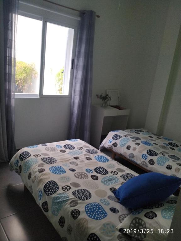 Postel nebo postele na pokoji v ubytování Apartamentos El Patio