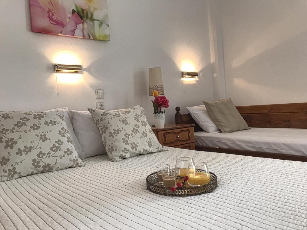 Llit o llits en una habitació de Cape Blue Apartments