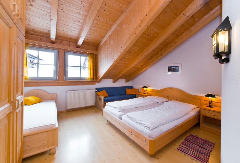 Postel nebo postele na pokoji v ubytování Almhaus Pfister OHG