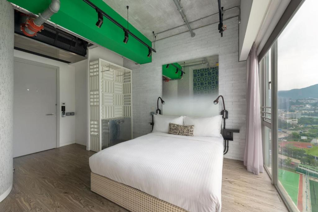 Letto o letti in una camera di Southside by Ovolo