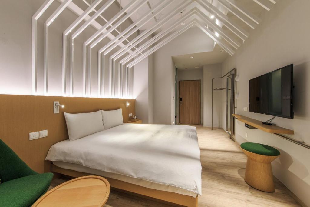 TV a/nebo společenská místnost v ubytování HOTEL PIN Jiaoxi