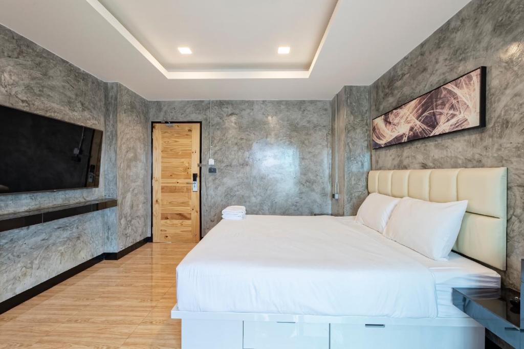 Postel nebo postele na pokoji v ubytování My Style Resort Hotel -SHA Plus