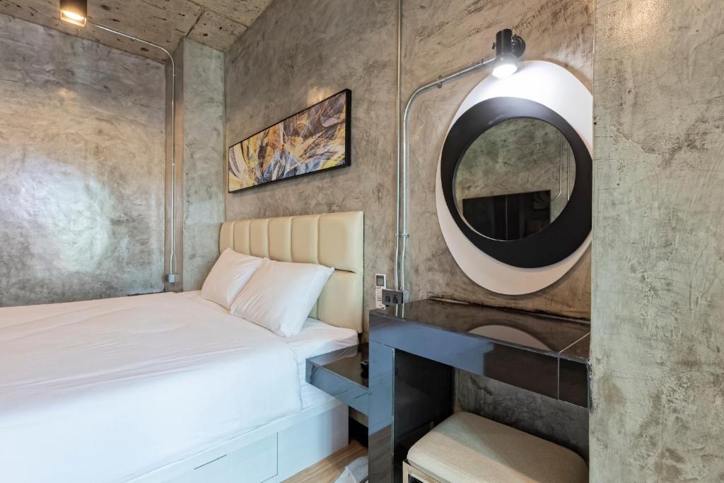 Postel nebo postele na pokoji v ubytování My Style Resort Hotel -SHA Plus