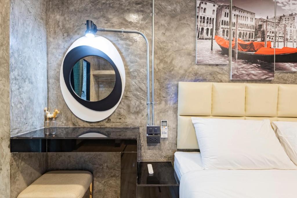 Postel nebo postele na pokoji v ubytování My Style Resort Hotel -SHA Plus