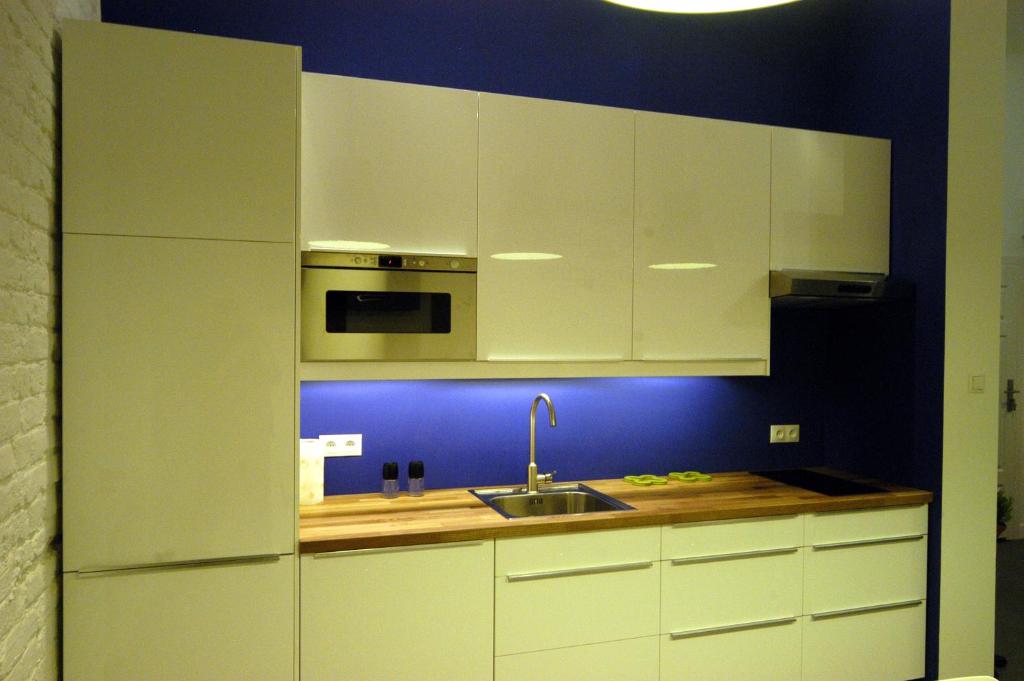Kuchyň nebo kuchyňský kout v ubytování Chmielna 5 Rooms & Apartments