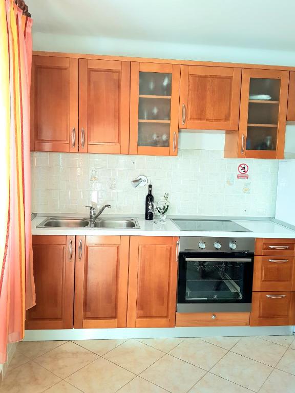 Kuchyňa alebo kuchynka v ubytovaní Apartman Perina