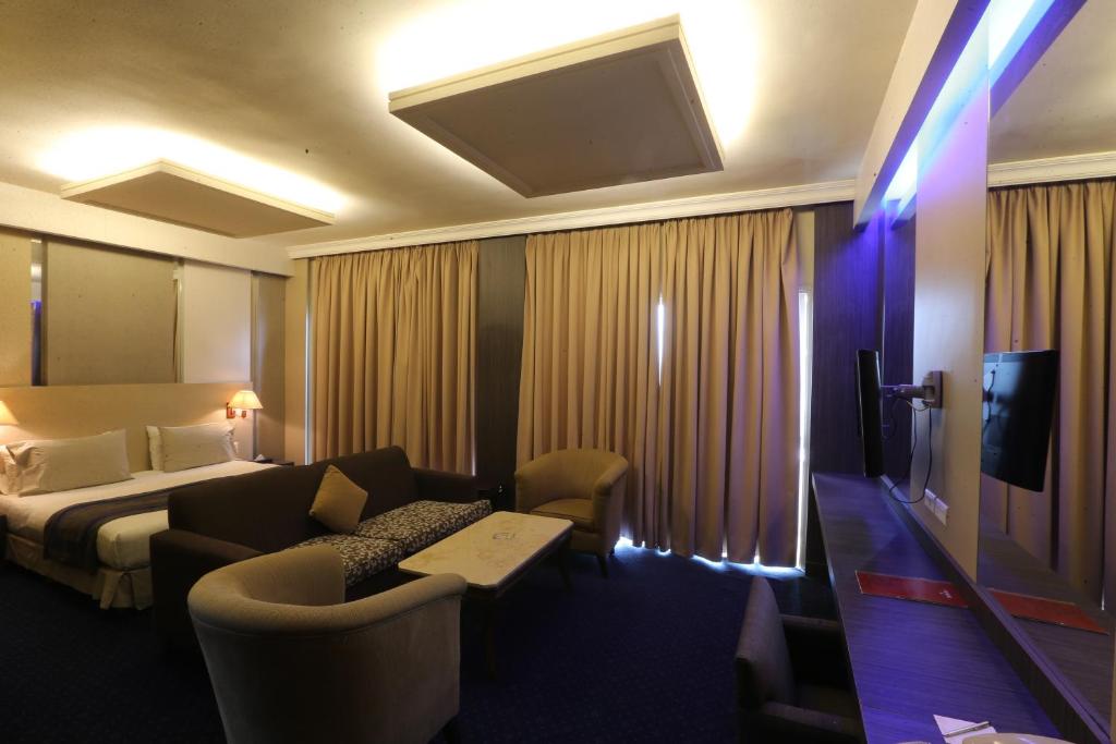 TV a/nebo společenská místnost v ubytování Padova Hotel