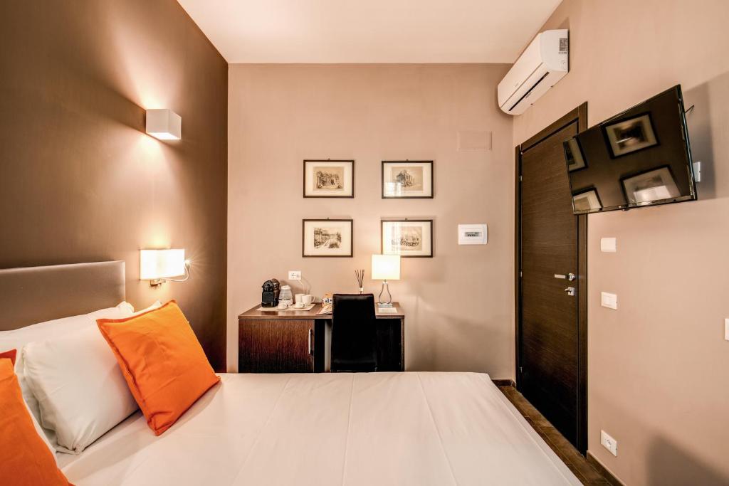Televízia a/alebo spoločenská miestnosť v ubytovaní H501 Luxury Rooms