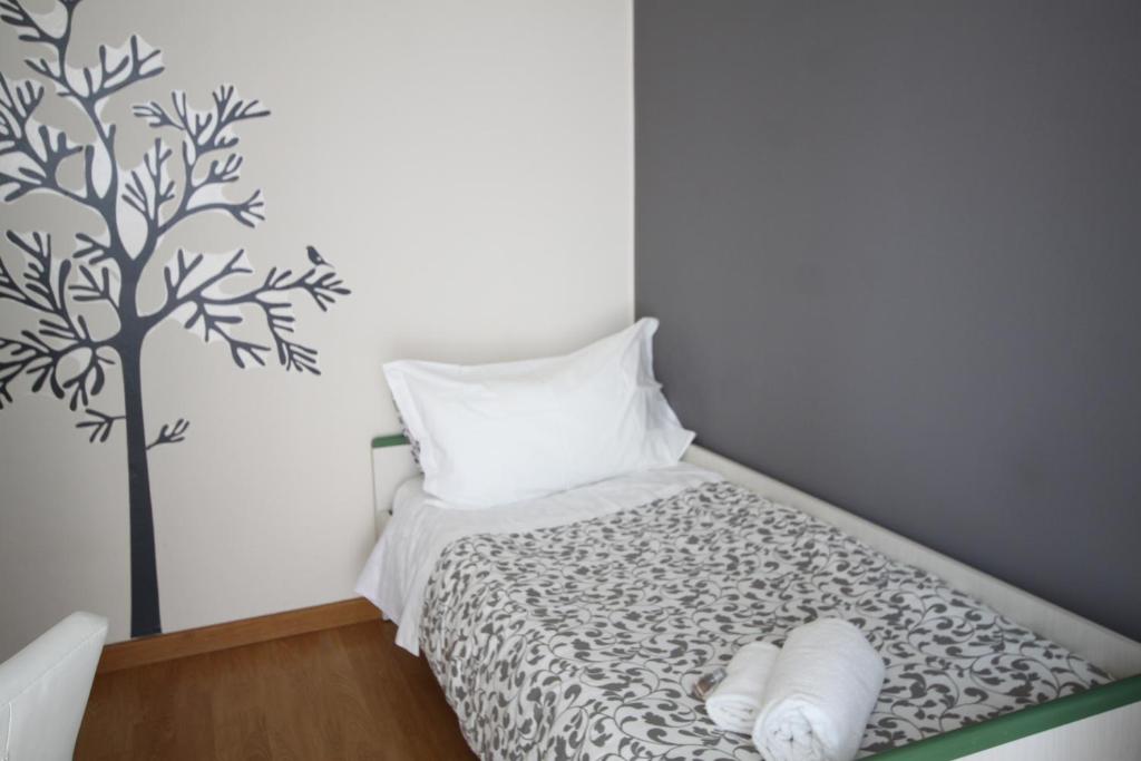 Postel nebo postele na pokoji v ubytování MyRoom In Town