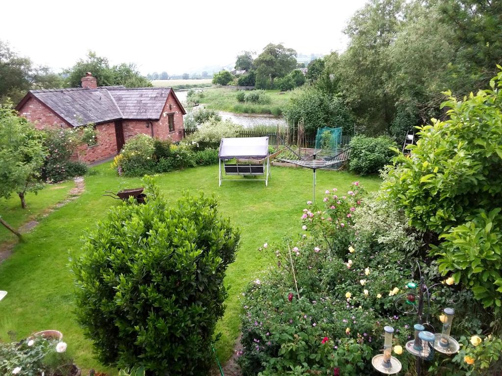 an aerial view of a garden with a house at Ferryman's Cottage in Glasbury
