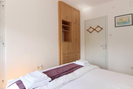 Posteľ alebo postele v izbe v ubytovaní Nina, apartment in city centre