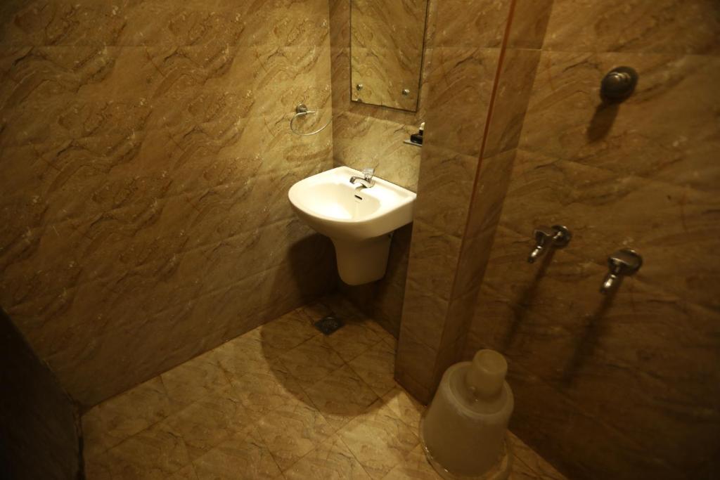 Koupelna v ubytování Nestlay Rooms Ambattur