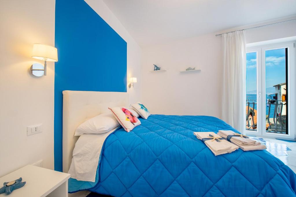 Postel nebo postele na pokoji v ubytování Caruso sea view
