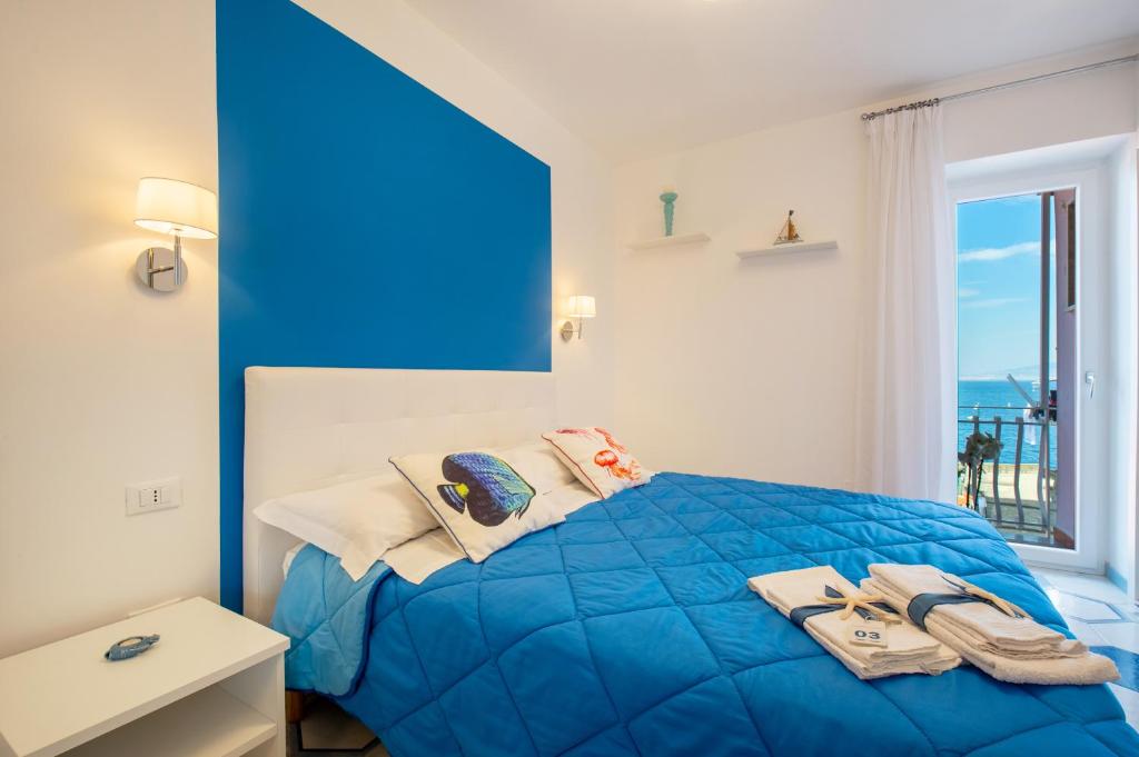 Postel nebo postele na pokoji v ubytování Caruso sea view