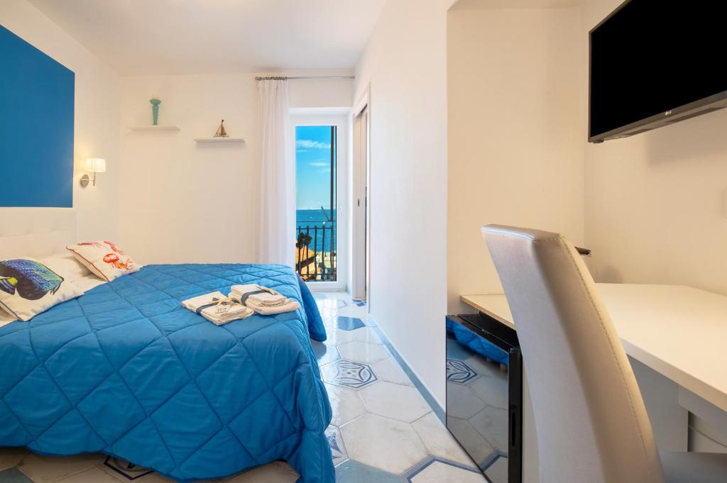 Postel nebo postele na pokoji v ubytování Caruso sea view