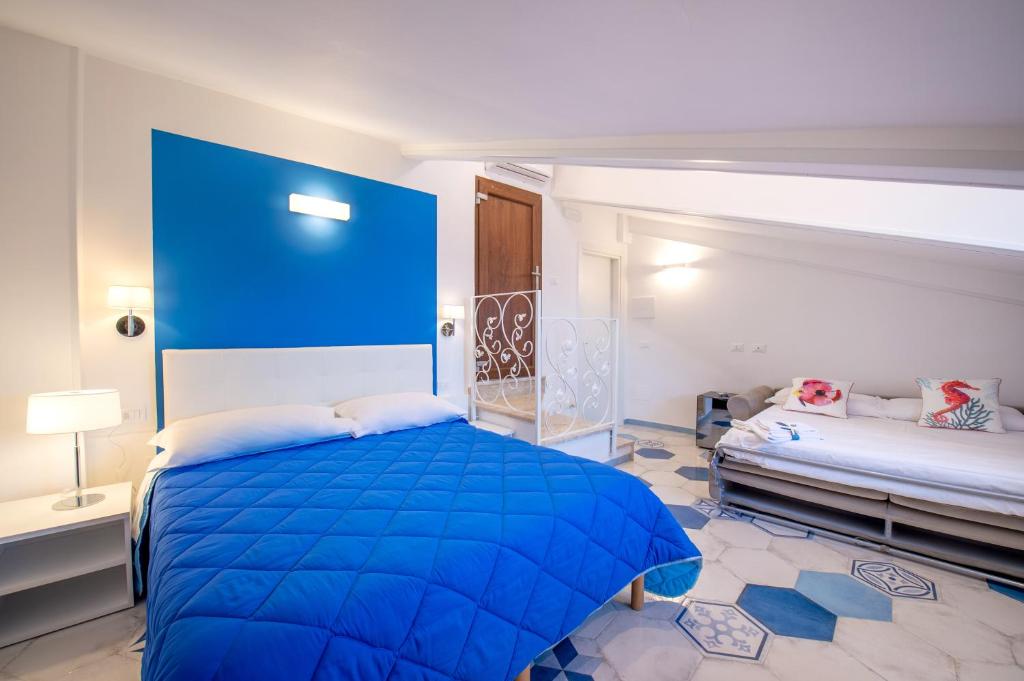 Postel nebo postele na pokoji v ubytování Caruso sea view