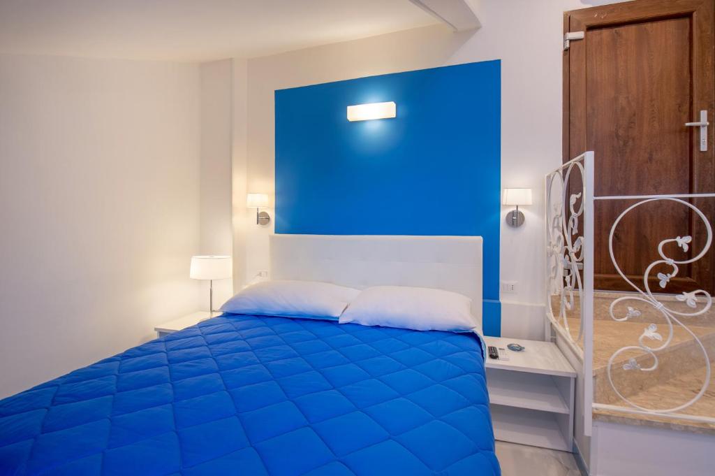 Postel nebo postele na pokoji v ubytování Caruso sea view