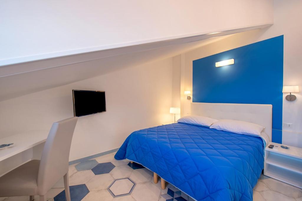 Postel nebo postele na pokoji v ubytování Caruso sea view