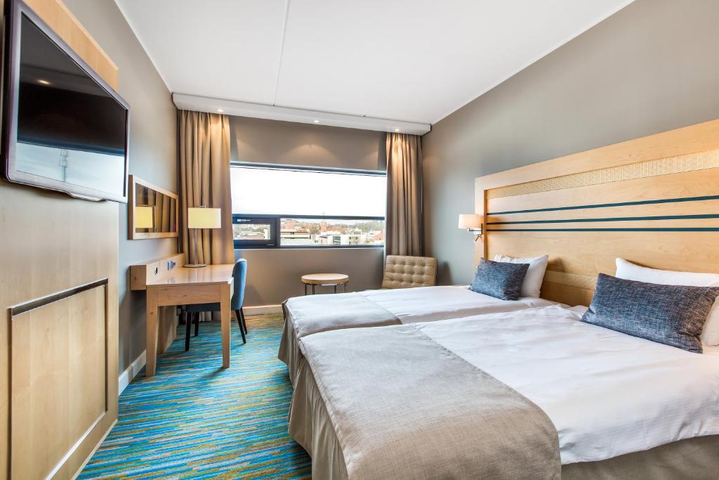 Postel nebo postele na pokoji v ubytování Quality Hotel Fredrikstad