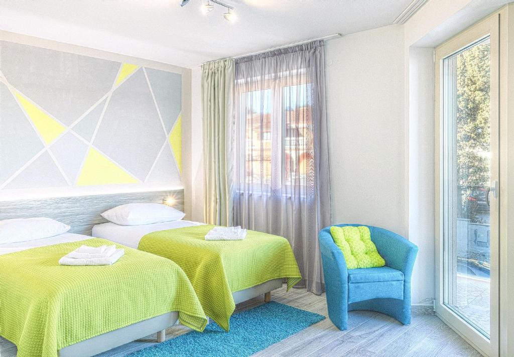 Postel nebo postele na pokoji v ubytování Hotel Modo