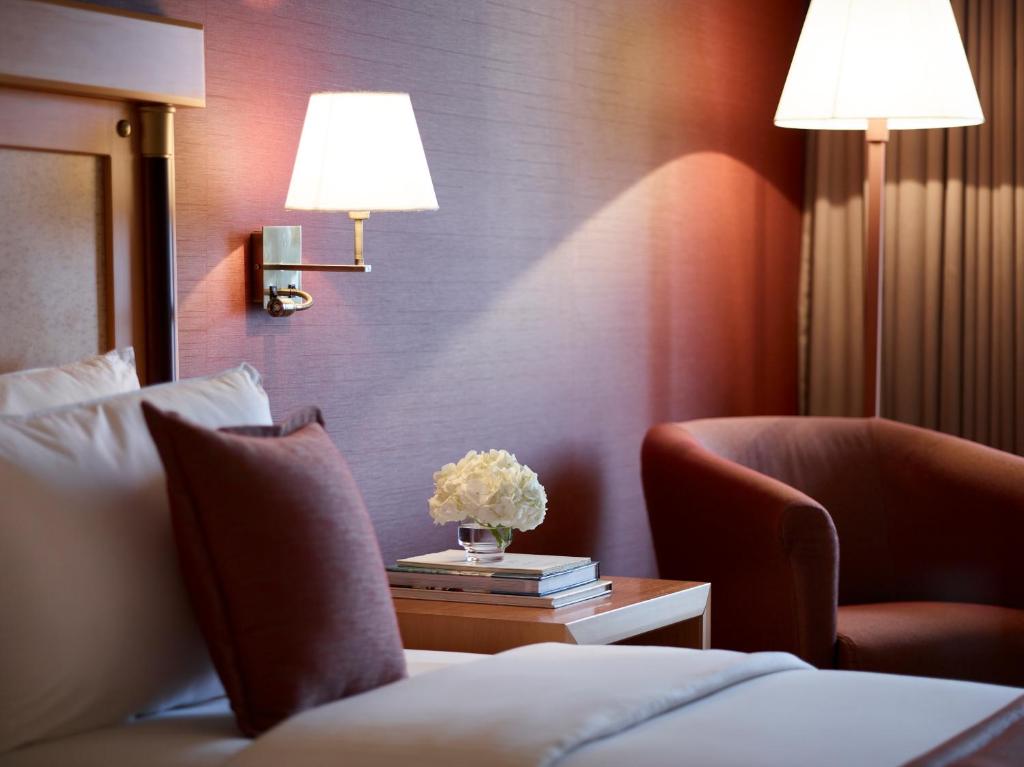 Postel nebo postele na pokoji v ubytování Athens Zafolia Hotel