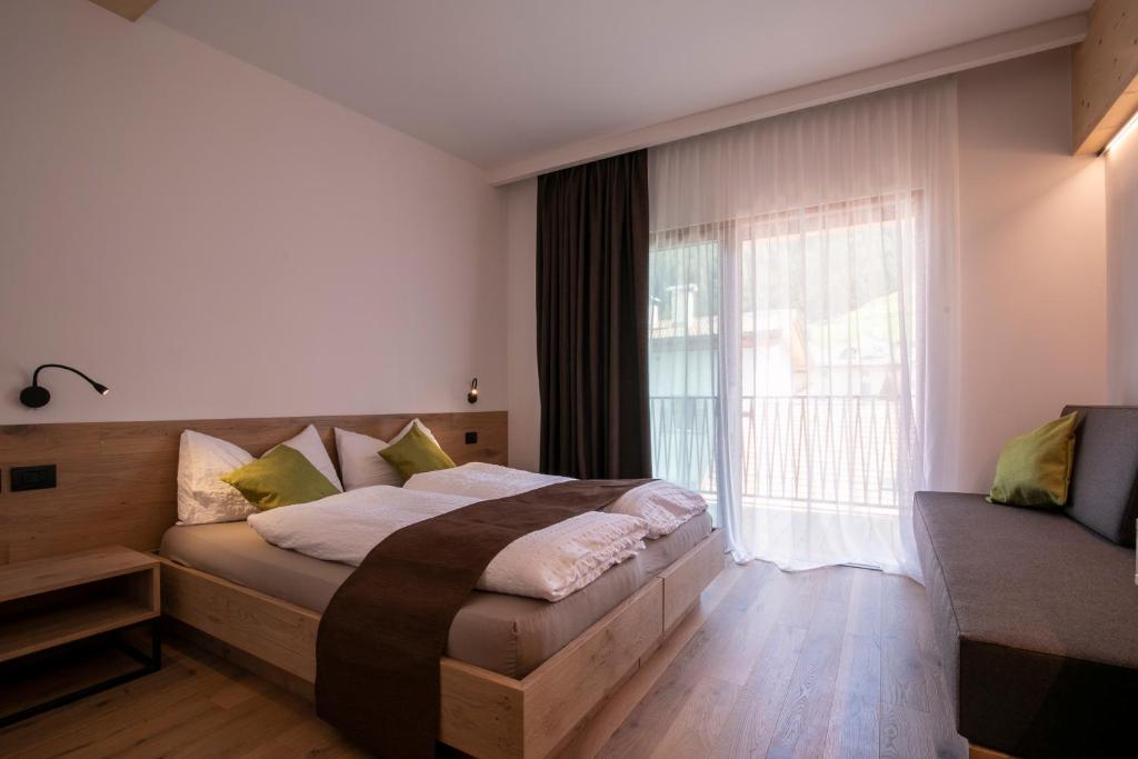 Postel nebo postele na pokoji v ubytování Active Hotel Rosat