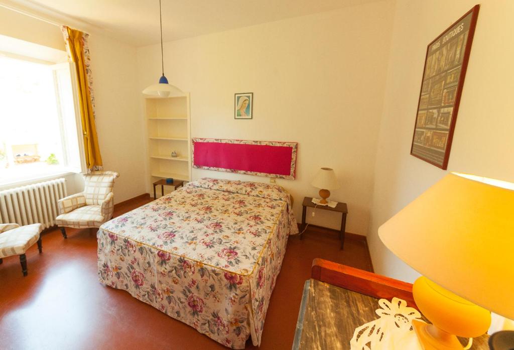 Postel nebo postele na pokoji v ubytování Residenza La Limonaia