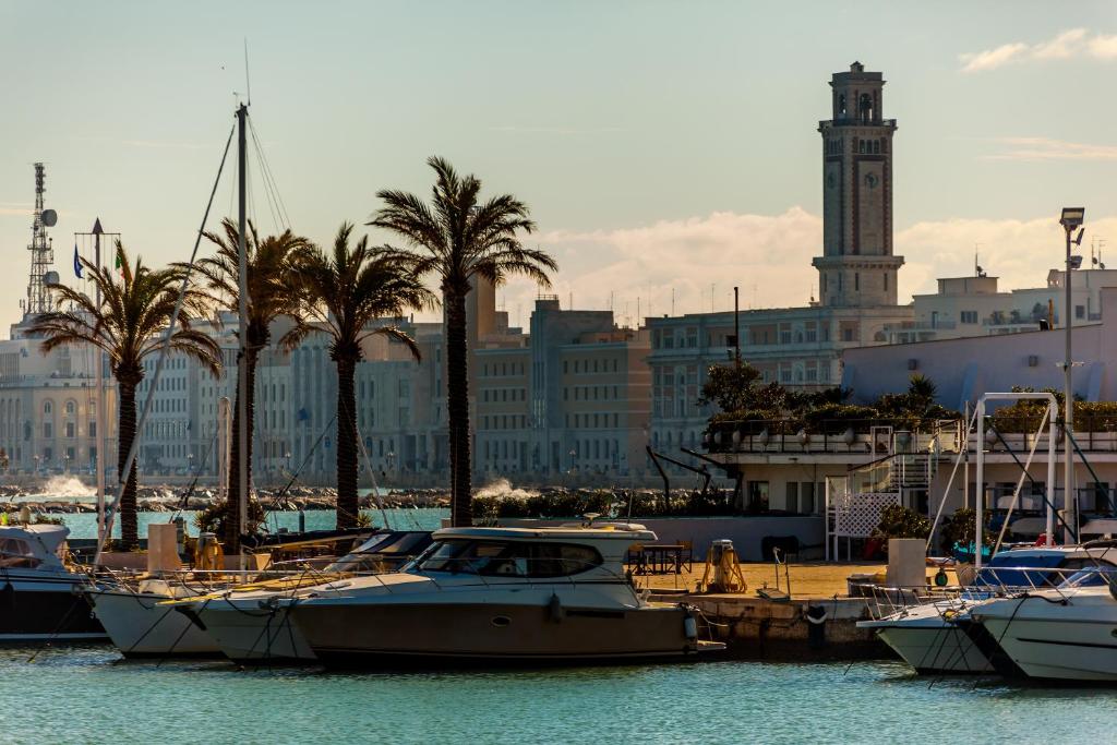 a group of boats are docked in a harbor at TRAVEL STATION Bedandbreakfast in Bari