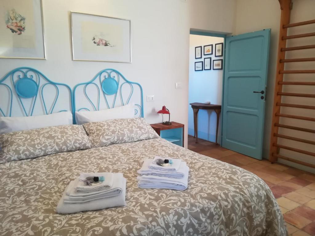Postel nebo postele na pokoji v ubytování B&B Conca Del Pretore