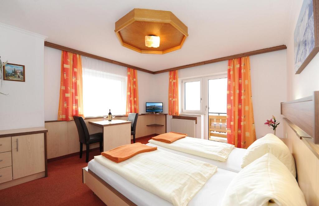 Postel nebo postele na pokoji v ubytování Hotel-Garni Seestrand
