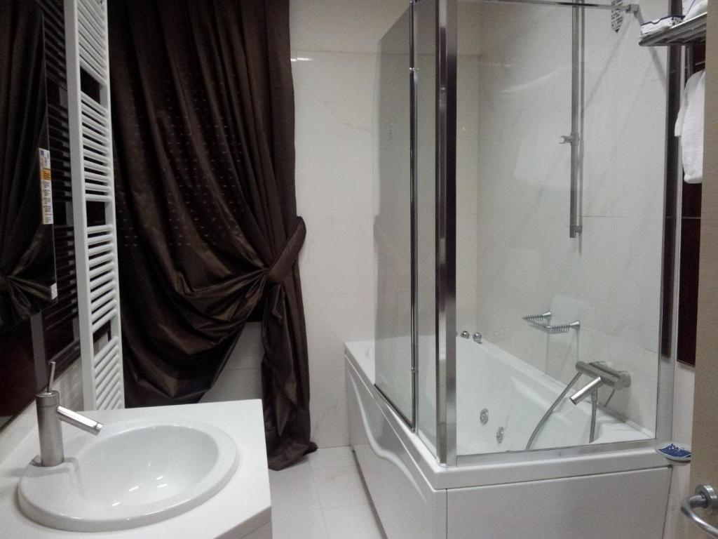 Koupelna v ubytování Hotel Valentino