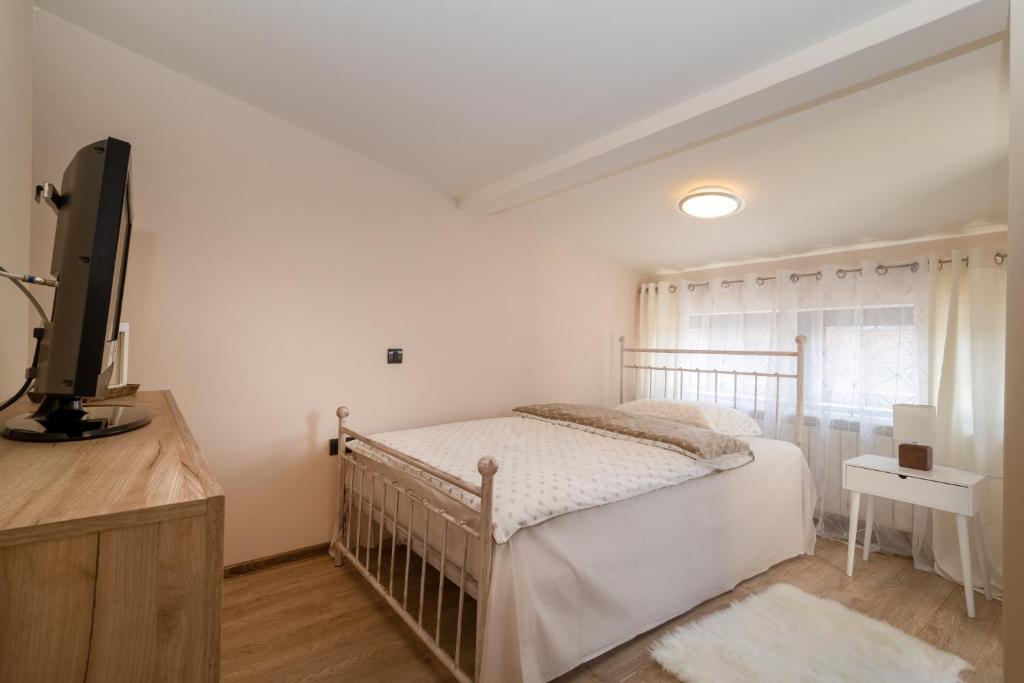 Postel nebo postele na pokoji v ubytování Central point Valjevo