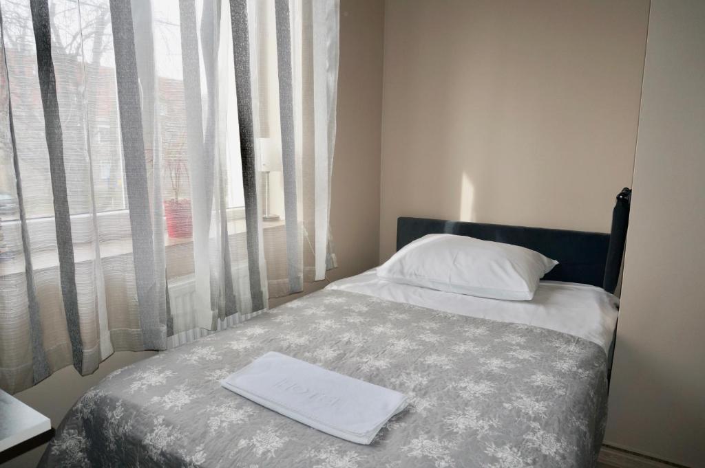 Postel nebo postele na pokoji v ubytování Sejf House