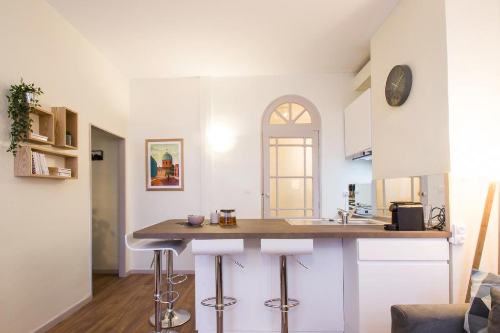 A cozinha ou kitchenette de Le Saint Nicolas by Cocoonr