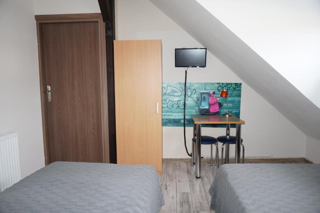 TV a/nebo společenská místnost v ubytování Sejf House