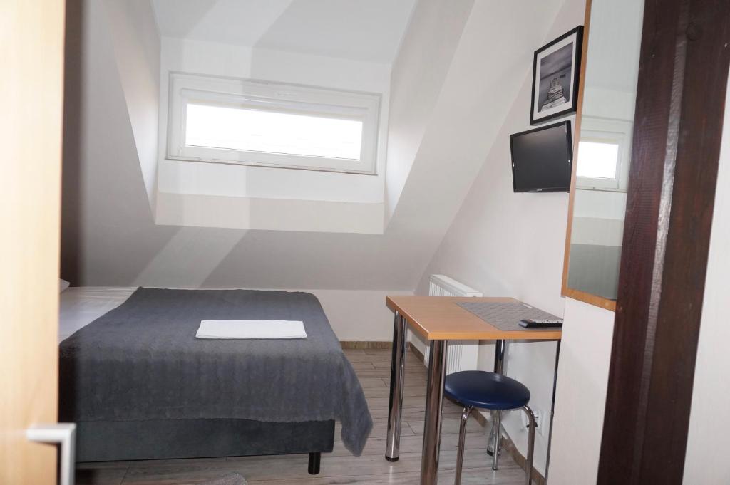 Postel nebo postele na pokoji v ubytování Sejf House