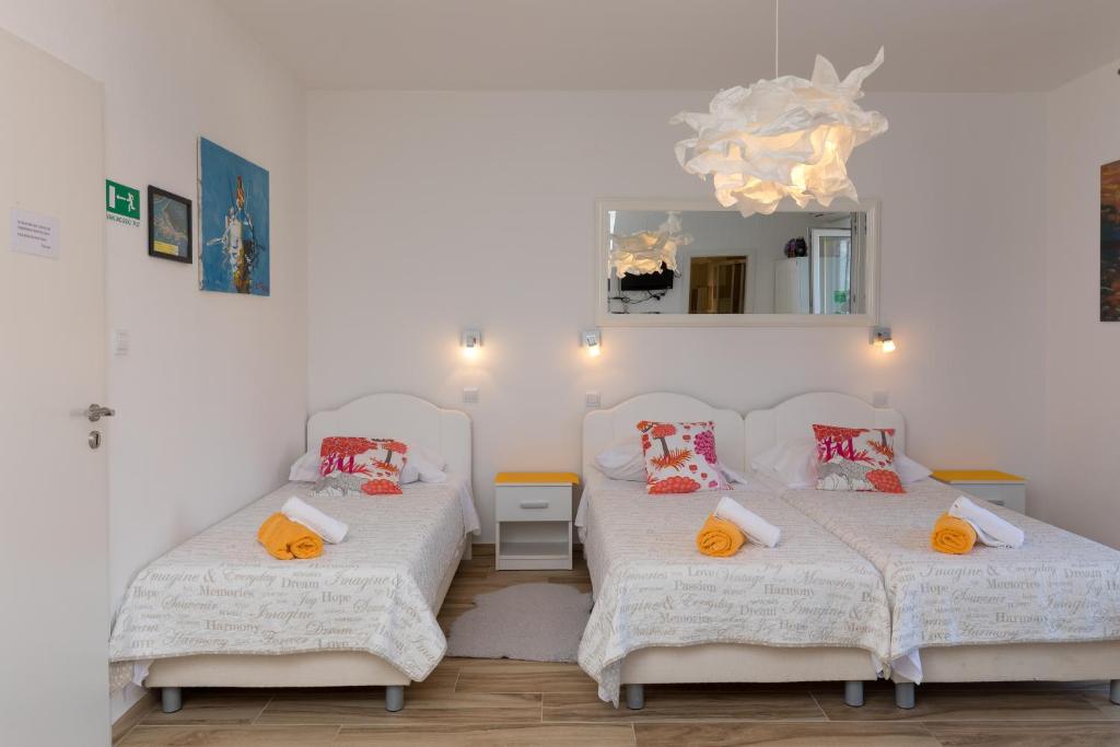 Postel nebo postele na pokoji v ubytování Apartments Lile