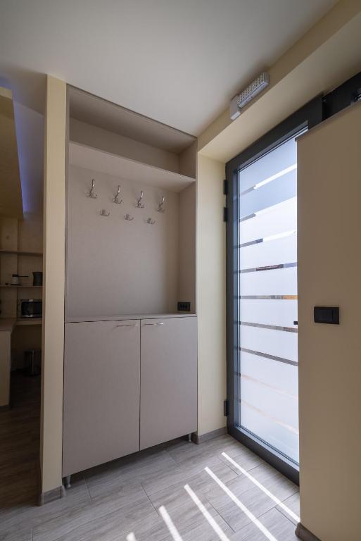 Kuchyň nebo kuchyňský kout v ubytování Central point Valjevo