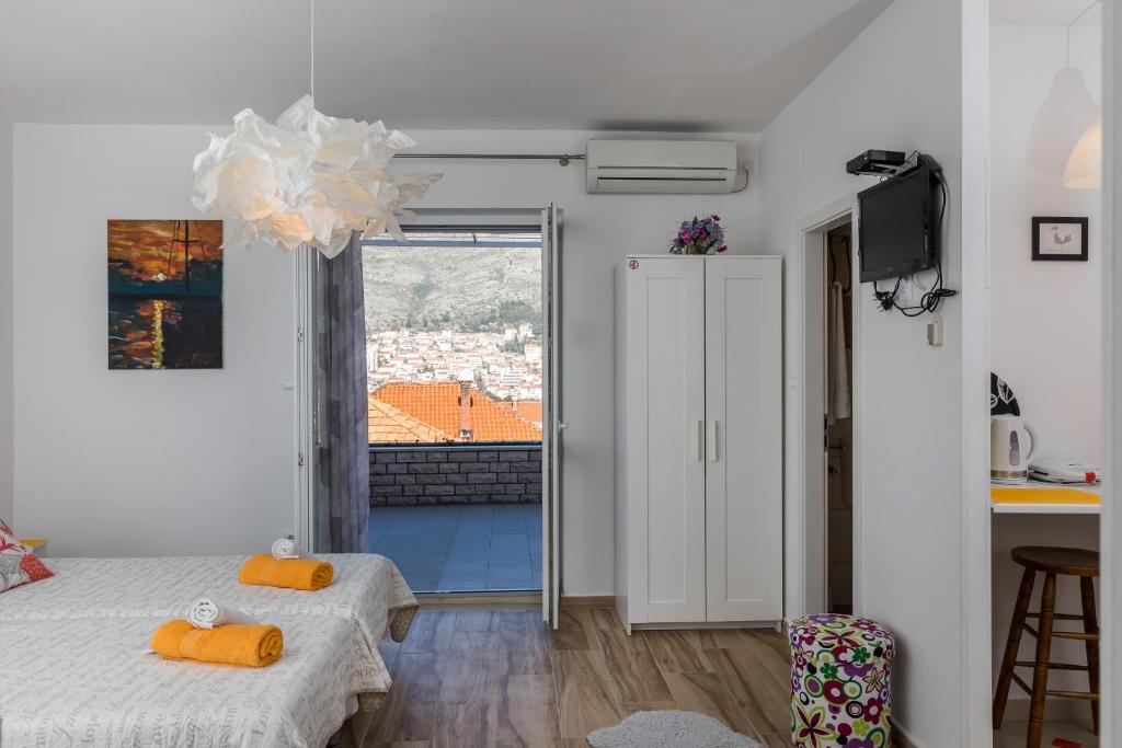 Postel nebo postele na pokoji v ubytování Apartments Lile