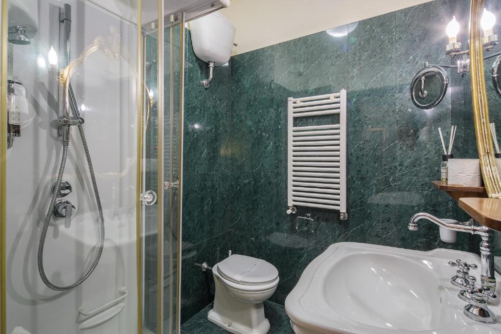 Koupelna v ubytování I Portici Hotel - Residenza D'Epoca