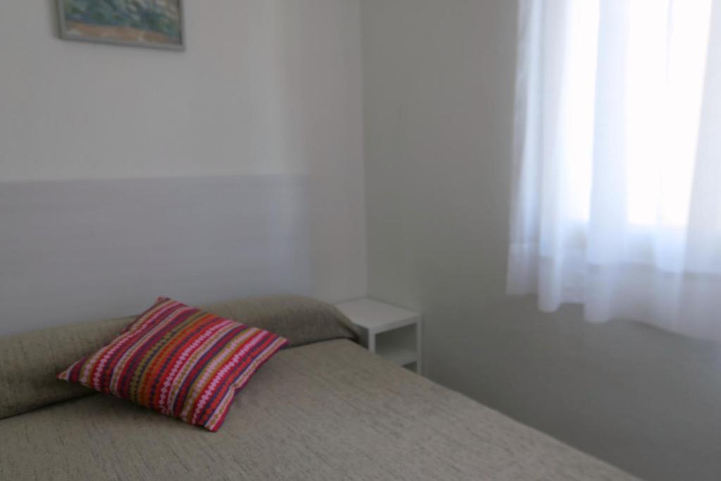 Postel nebo postele na pokoji v ubytování Cala Dorada Rentalmar