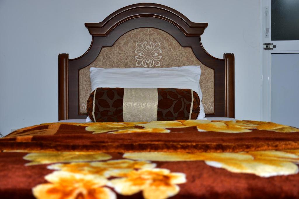 Postel nebo postele na pokoji v ubytování Namadi Nest home stay