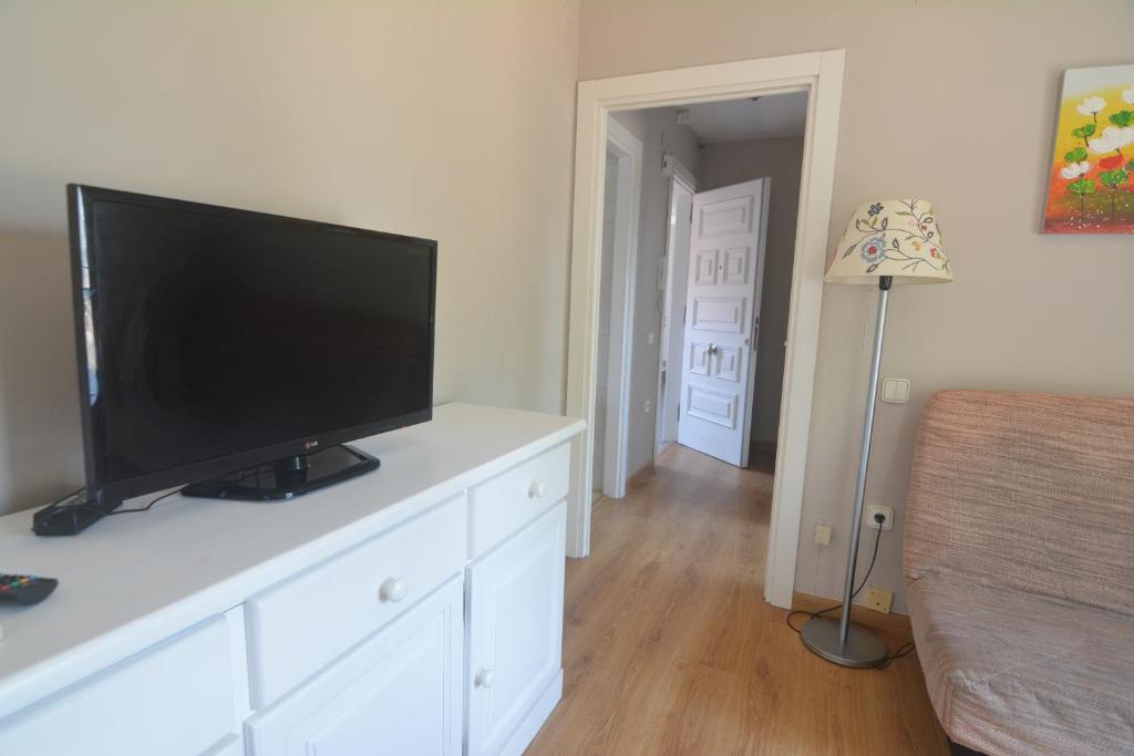 Televízia a/alebo spoločenská miestnosť v ubytovaní Palfuriana 86, a 30 metros de la playa WIFI ideal con niños (21)