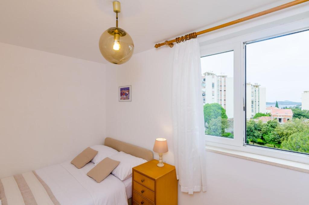 Postel nebo postele na pokoji v ubytování City Vista Apartment Dubrovnik