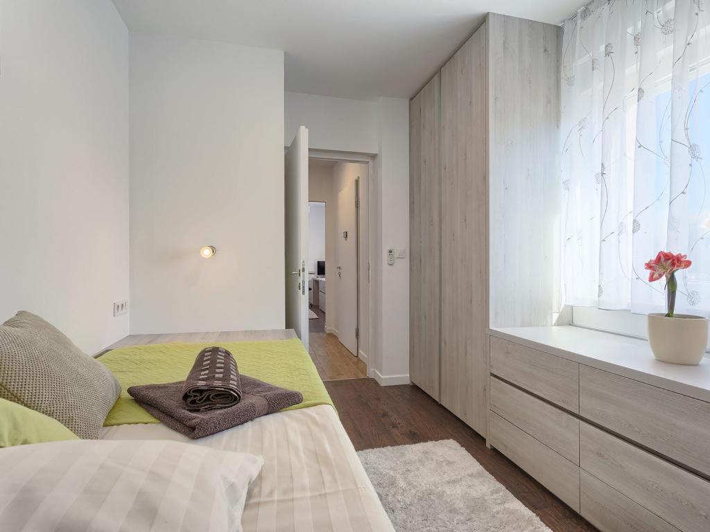 Posteľ alebo postele v izbe v ubytovaní Vacation Home Bokan
