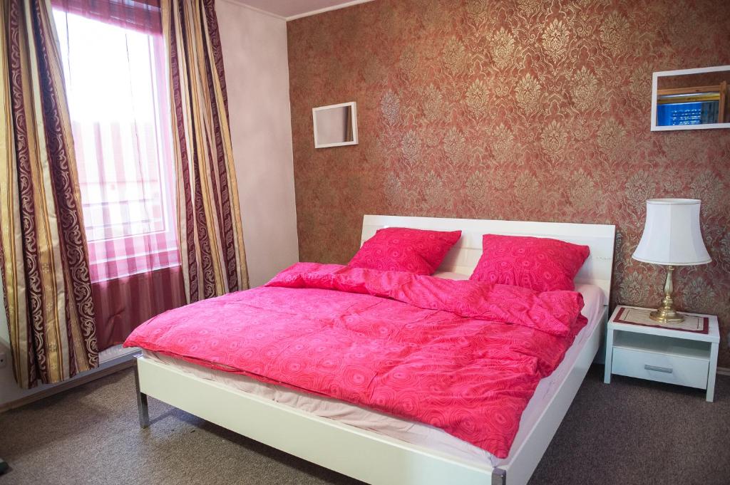 Кровать или кровати в номере Zimmer in Celle