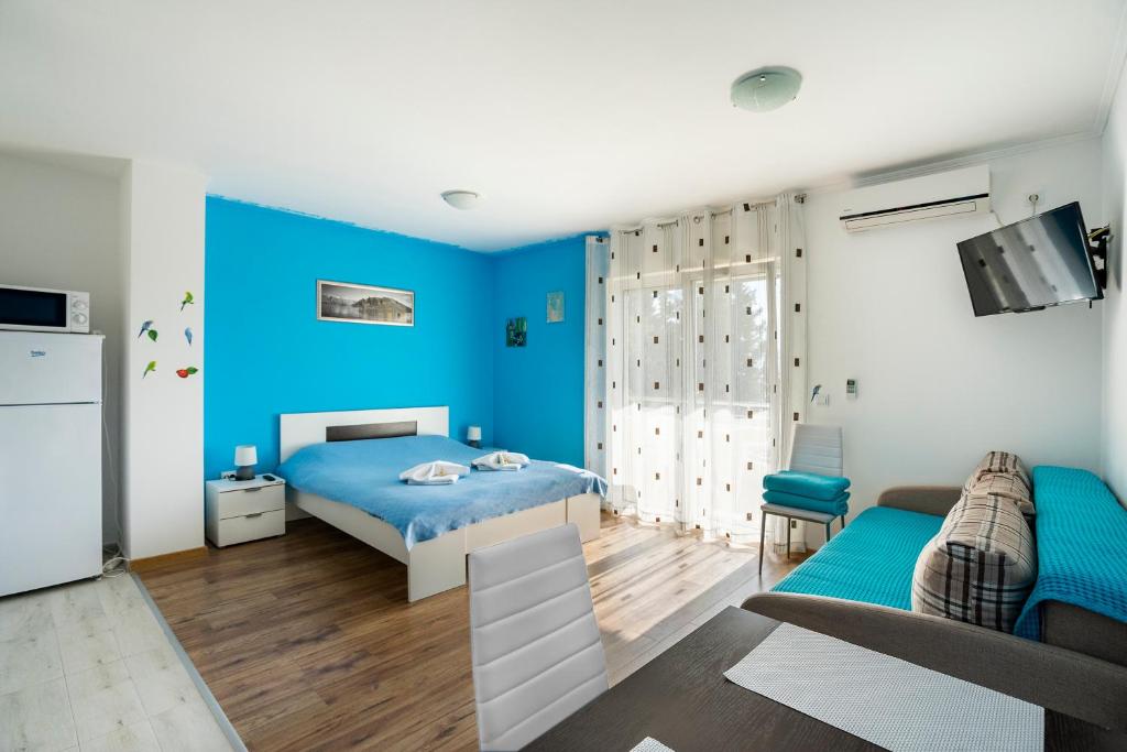 Postel nebo postele na pokoji v ubytování Apartments Viktoria