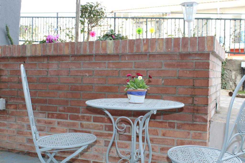 Balkón nebo terasa v ubytování IL GIARDINO DEI GLICINI