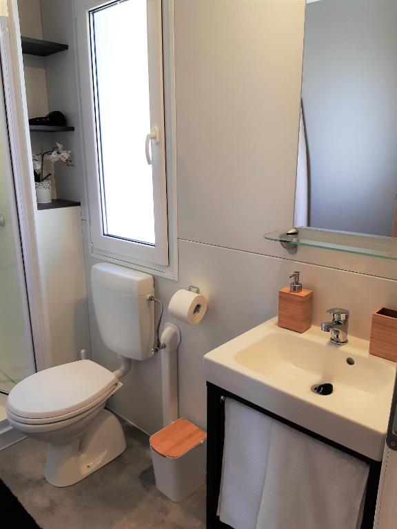 Kúpeľňa v ubytovaní OTIUM mobile homes