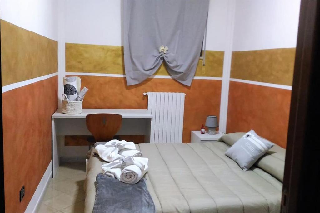 Posteľ alebo postele v izbe v ubytovaní A casa da Mimì&Cocò